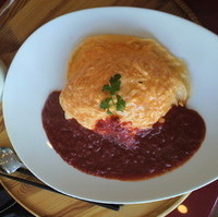 芽ぶきのオムライス　じっくり煮込んだトマ…