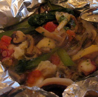 タコとツブ貝のエスカルゴバター焼き