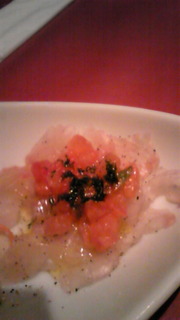 本日の白身魚のカルパッチョ・黒オリーブソースで