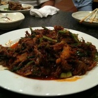 犬肉のピリ辛炒め